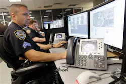 Police officers work in the operations center of the Lower Manhattan Security Coordination Center. Police officers work in the operations center of the Lower Manhattan Security Coordination Center.