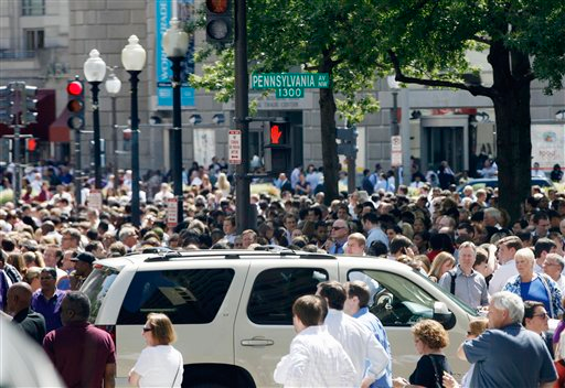 People crowd Pennsylvania Avenue in Washington as buildings were evacuated following an earthquake.