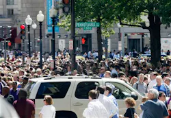 People crowd Pennsylvania Avenue in Washington as buildings were evacuated following an earthquake. People crowd Pennsylvania Avenue in Washington as buildings were evacuated following an earthquake.