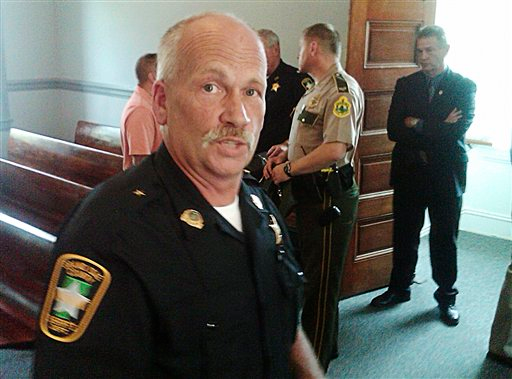 Grand Isle County Sheriff Ray Allen pauses as he is sworn in.
