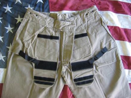 Each front pocket has an adjustable holster built in.