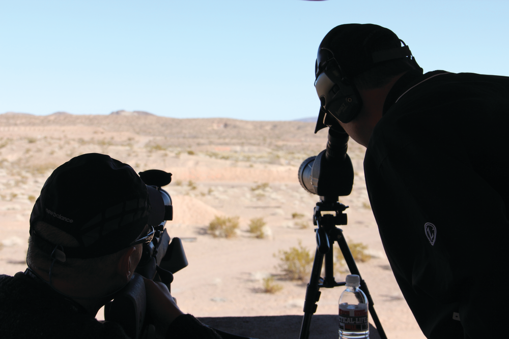 About 20 miles from SHOT Show exhibit hall at Boulder City Rifle Club, range-goers zero in on new firearms and accessories, such as sights.
