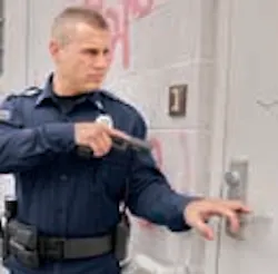 Lshspolicegunpointedatdoor 10727770 Lshspolicegunpointedatdoor 10727770