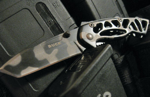 Buck Knives Small Bones Knife on vest