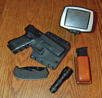 Your travel Every Day Carry (EDC): gun, spare mag, knife, light, GPS