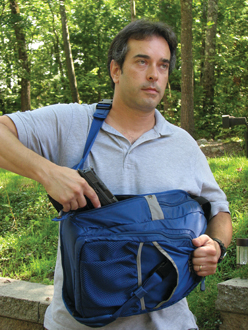 Slipping the pack under the off shoulder places the CCW pull tab at your fingertips and provides easy access to the gun.