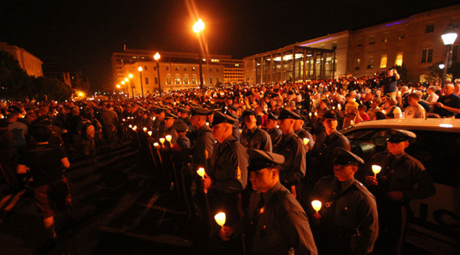 Officers are seen at the 24th Annual Candlelight Vigil in Judiciary Square in Washington, D.C. on May 13, 2012.