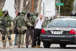 The Wichita Police SWAT team converge on a house in the 2400 block of Newell, near Meridian and Central on Jan. 9. The Wichita Police SWAT team converge on a house in the 2400 block of Newell, near Meridian and Central on Jan. 9.