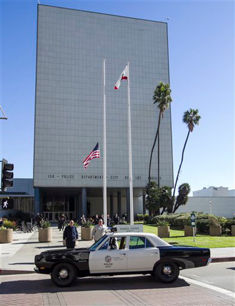 A 1969 Plymouth Belvedere police patrol car is parked in front of Los Angeles Police Department's Parker Center on Jan. 15.