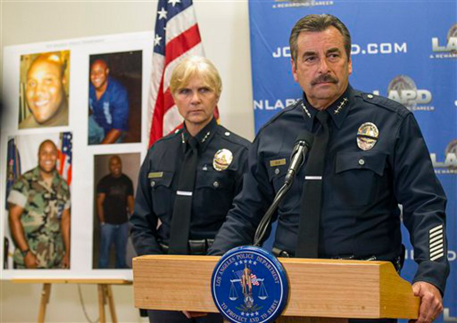 LAPD Chief Charlie Beck, right, comments on fired officer, Christopher Dorner during a news conference on Feb. 7.
