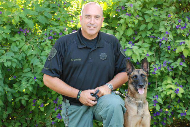 Sgt. Gilbert Cortez is seen with K-9 partner Mattie.