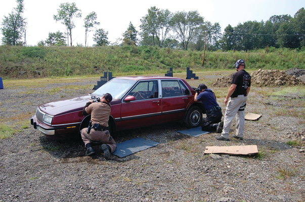 Carbine instructors run through two man scrambler drills