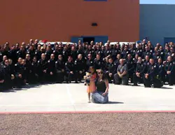 Tatum Raetz, the daughter of fallen Phoenix Officer Daryl Raetz, was joined by close to 100 officers at her kindergarten graduation on May 22. Tatum Raetz, the daughter of fallen Phoenix Officer Daryl Raetz, was joined by close to 100 officers at her kindergarten graduation on May 22.