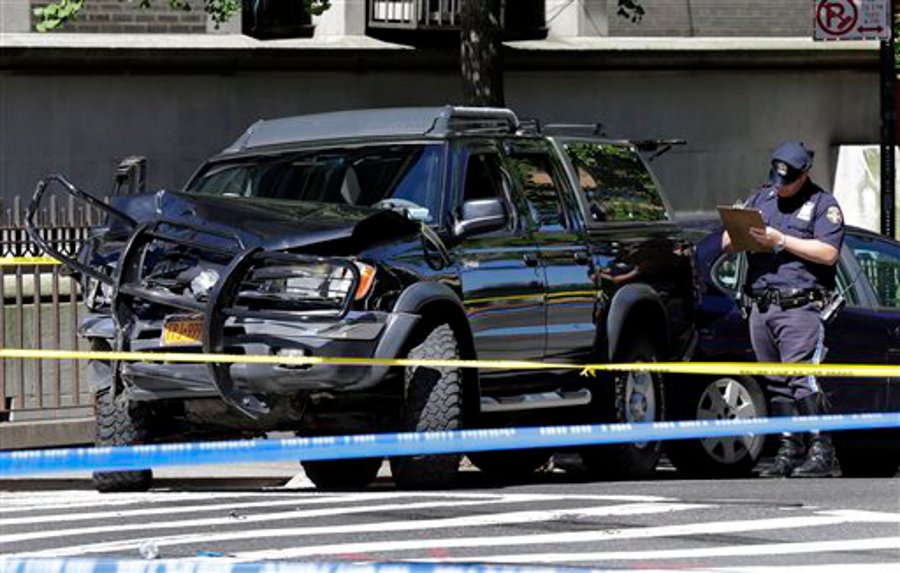 New York City Police investigate an automobile that was involved in a accident on New York's Upper West Side on June 4.
