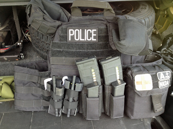 This plate carrier has an IFAK, 2 rifle mags, 2 pistol mags, 2 tourniquets and more.