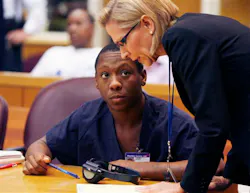 Nicholas Lindsey, left, looks at his attorney Stacey Schroeder, right, during his resentencing hearing at the Pinellas County Justice Center in Largo, Fla. on Sept. 23. Nicholas Lindsey, left, looks at his attorney Stacey Schroeder, right, during his resentencing hearing at the Pinellas County Justice Center in Largo, Fla. on Sept. 23.