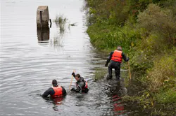 Authorities search the Flat River, near the Ashfield Street bridge, for Devon Morrison, 10, in Belding, Mich. on Sept. 16. Authorities search the Flat River, near the Ashfield Street bridge, for Devon Morrison, 10, in Belding, Mich. on Sept. 16.