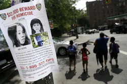 A poster soliciting information regarding an unidentified body near the site where the body was found is seen in New York. A poster soliciting information regarding an unidentified body near the site where the body was found is seen in New York.