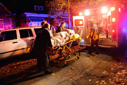 An unidentified person is moved to an ambulance after four people were shot, resulting in one fatality in Chicago's South Side on Nov. 6. An unidentified person is moved to an ambulance after four people were shot, resulting in one fatality in Chicago's South Side on Nov. 6.