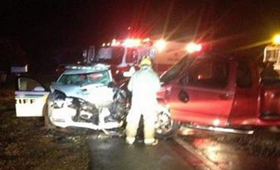 Pasco County Sheriff's Deputy Darren R. Hill suffered two broken legs in addition to a broken arm in a head-on hit-and-run crash Wednesday morning.