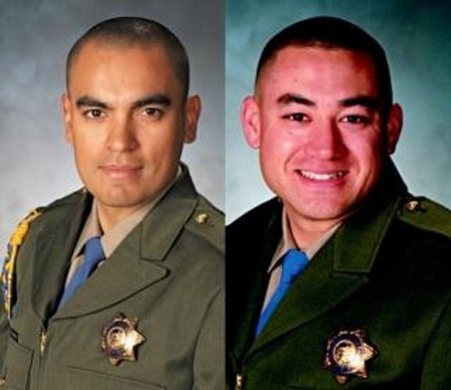 Officers Juan Gonzalez, left, and Brian Law