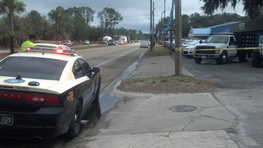 Taylor County Deputy Robert Lundy was getting his patrol car serviced at a dealership when an employee opened fire.