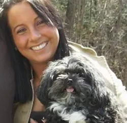 Nicole Dale is seen with her dog, Mit, that was saved by Farmington police officer after it began choking on a dental bone. Nicole Dale is seen with her dog, Mit, that was saved by Farmington police officer after it began choking on a dental bone.