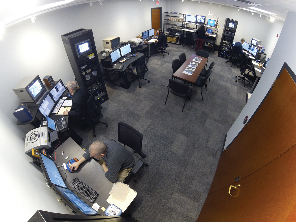 Analysts are seen working inside the New York State Police Forensic Video and Multimedia Services unit's newly renovated office.