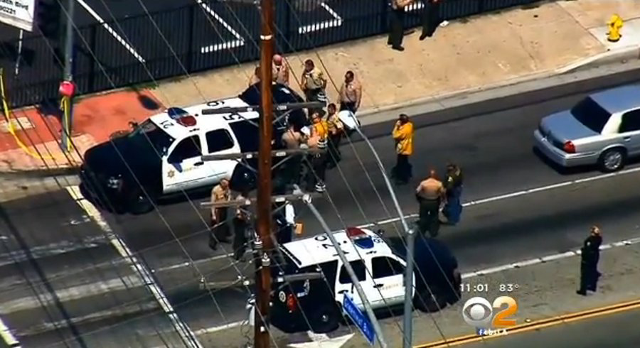 A Los Angeles County sheriff's deputy is in stable condition following surgery after being shot in the stomach by a transient in Long Beach in an exchange of fire that left the suspect dead.