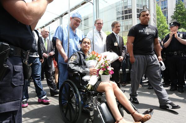 Officer Rosa Rodriguez was injured in a building fire that killed fellow Officer Dennis Guerra on April 6.