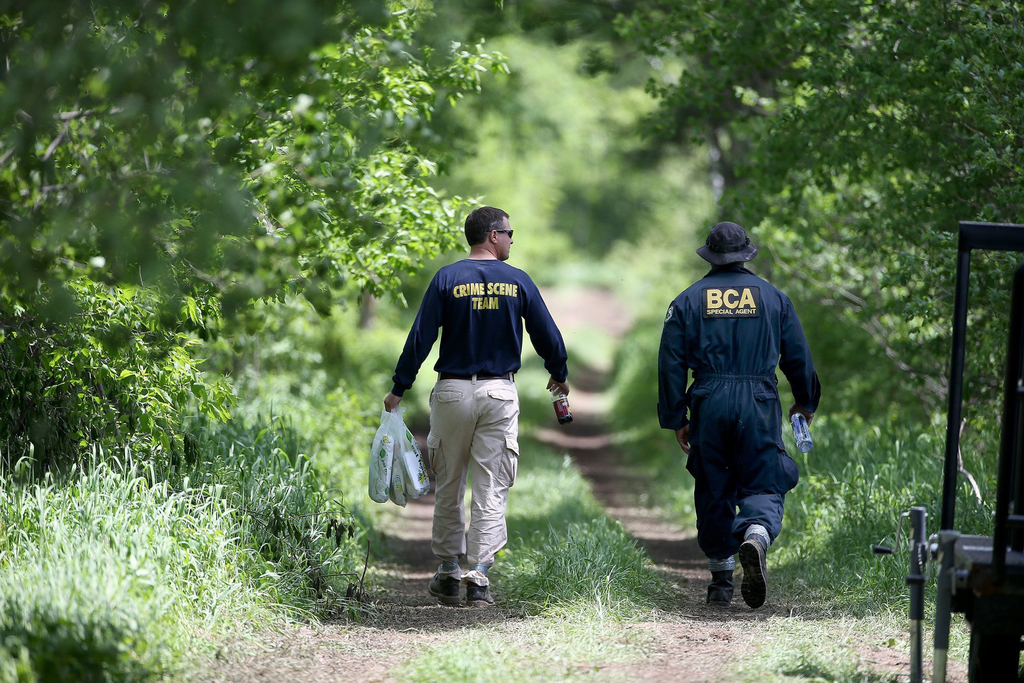 Members of the Minnesota Bureau of Criminal Apprehension searched an area on June 3 in Stanchfield, Minn.