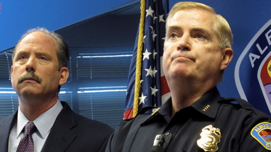 Albuquerque Mayor Richard Berry, left, and Police Chief Gorden Eden speak to reporters on April 10.