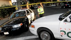 Pasadena police officers block off a street corner following a shooting in residential Pasadena neighborhood, in Pasadena, Calif. on July 12. Pasadena police officers block off a street corner following a shooting in residential Pasadena neighborhood, in Pasadena, Calif. on July 12.