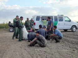 Border Patrol agents detain immigrants who crossed from Mexico into the United States near McAllen on June 27. Border Patrol agents detain immigrants who crossed from Mexico into the United States near McAllen on June 27.