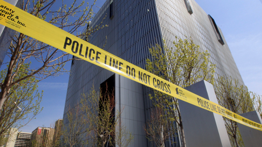 Police tape surrounds the Federal Courthouse, in Salt Lake City on April 21.