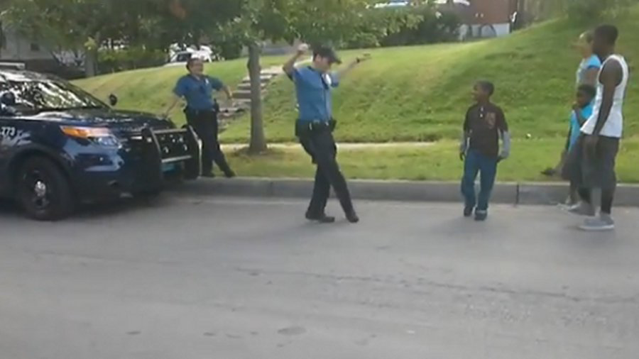 A rookie Kansas City police officer showed off his 'best' moves during a dance-off with a group of neighborhood kids over the weekend.