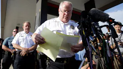 Ferguson Police Chief Thomas Jackson releases the name of the the officer accused of fatally shooting Michael Brown, an unarmed black teenager, on Aug. 15. Ferguson Police Chief Thomas Jackson releases the name of the the officer accused of fatally shooting Michael Brown, an unarmed black teenager, on Aug. 15.