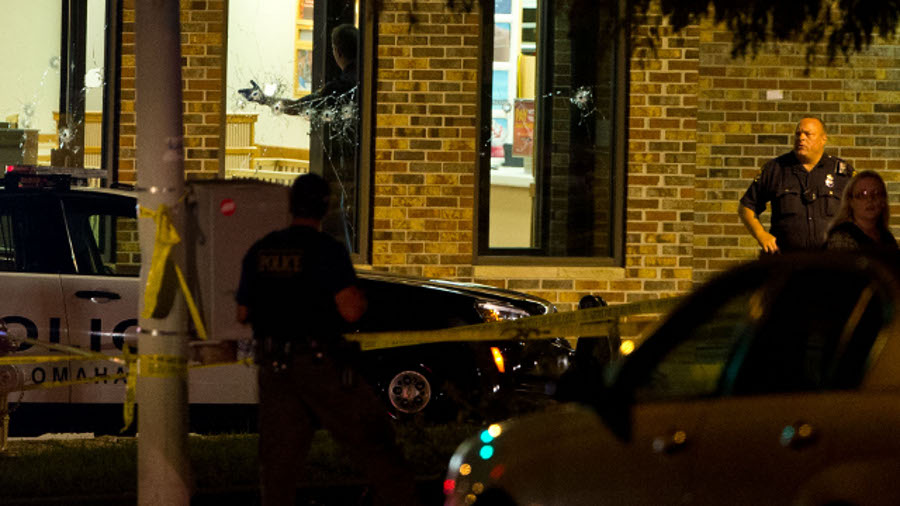 Omaha police are on the scene of an officer-involved shooting in Omaha. A suspect was shot dead and a crewman with the 'Cops' television show was wounded.