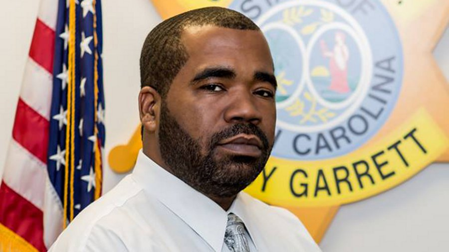 Investigator Holmes Smith