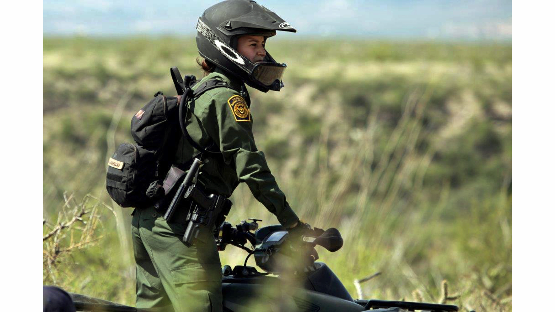 Crystal A. Diaz, a U.S. Border Patrol agent with the Tucson Sector in Arizona, rides her ATV while on patrol.