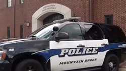 A female jumped out from under a blanket holding an 18-inch long blade swinging at a Mountain Brook police officer's head and neck area, striking him in the arm. A female jumped out from under a blanket holding an 18-inch long blade swinging at a Mountain Brook police officer's head and neck area, striking him in the arm.