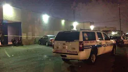 Two Houston police officers are uninjured and two suspects are in custody after shots were fired at them from a moving car early Tuesday morning. Two Houston police officers are uninjured and two suspects are in custody after shots were fired at them from a moving car early Tuesday morning.