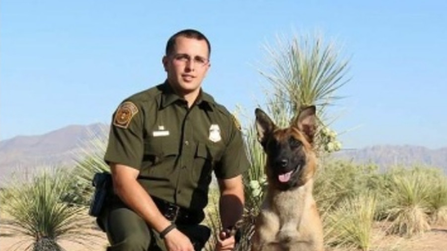 Agent Jose Daniel Barraza, left, and K-9 Vino