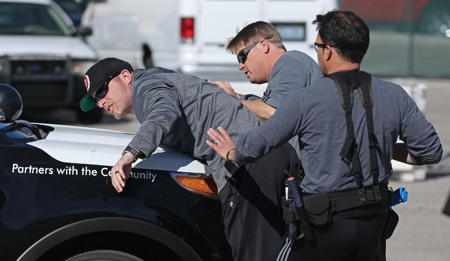 Las Vegas Metropolitan Police Department Officers Hector Leal, from right, and Chris Church detain fellow officer Joe Hearns in a car stop scenario during 'Advanced Officer Skills Training' at the Mojave Training Center on Feb. 18. Hearns played a driver showing levels of aggressive resistance on the 'Use of Force Model' scale.