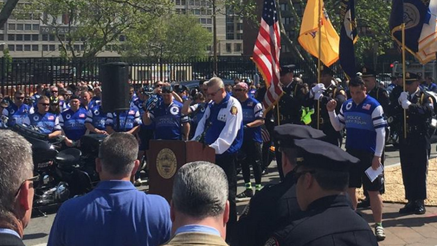 A ceremony is held in Jersey City, New Jersey Monday before a group leaves for the National Law Enforcement Officers Memorial in Washington, D.C. as part of the Police Unity Tour.