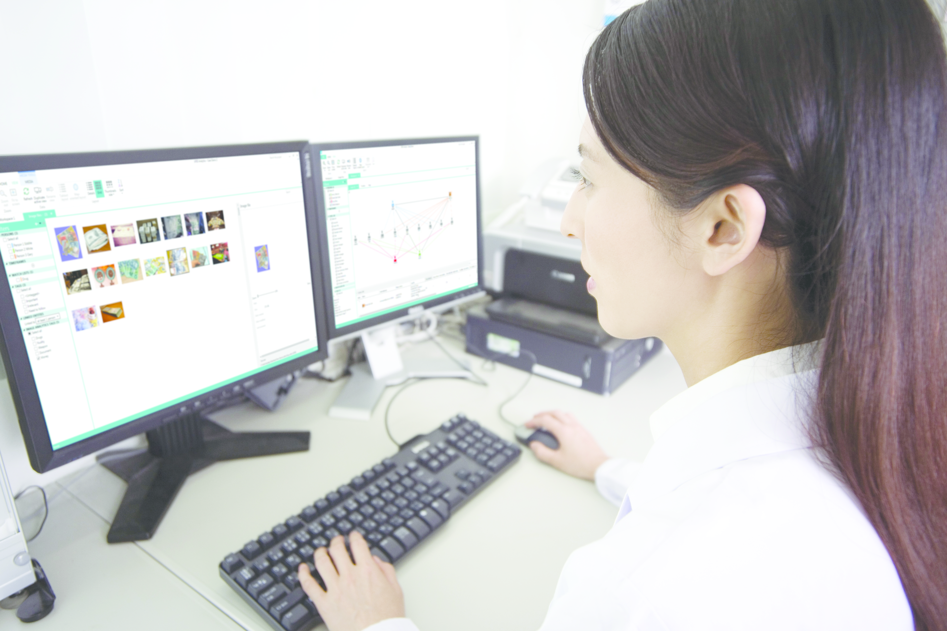 Female Analyst looking at the computer monitor 575582fb4b9bd