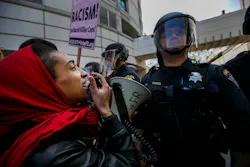 Anti-Trump protesters clash with the police outside the California Republican Convention on April 29. Anti-Trump protesters clash with the police outside the California Republican Convention on April 29.