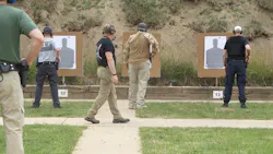 Wes troops the line, keeping a watchful eye on a relay. Wes troops the line, keeping a watchful eye on a relay.