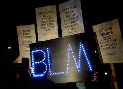 Protesters hold signs during a gathering outside Jail Central in uptown Charlotte on Sept. 30. Protesters hold signs during a gathering outside Jail Central in uptown Charlotte on Sept. 30.