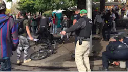 Police officers in Eugene were making a drug arrest in the city's downtown Friday afternoon when they were confronted by an angry mob. Police officers in Eugene were making a drug arrest in the city's downtown Friday afternoon when they were confronted by an angry mob.